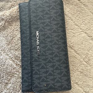 Michael Korr’s  wallet only been used a couple times